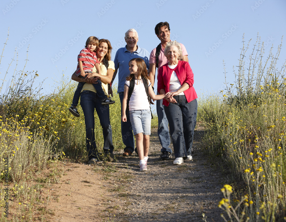 Multi-generation family on country walk
