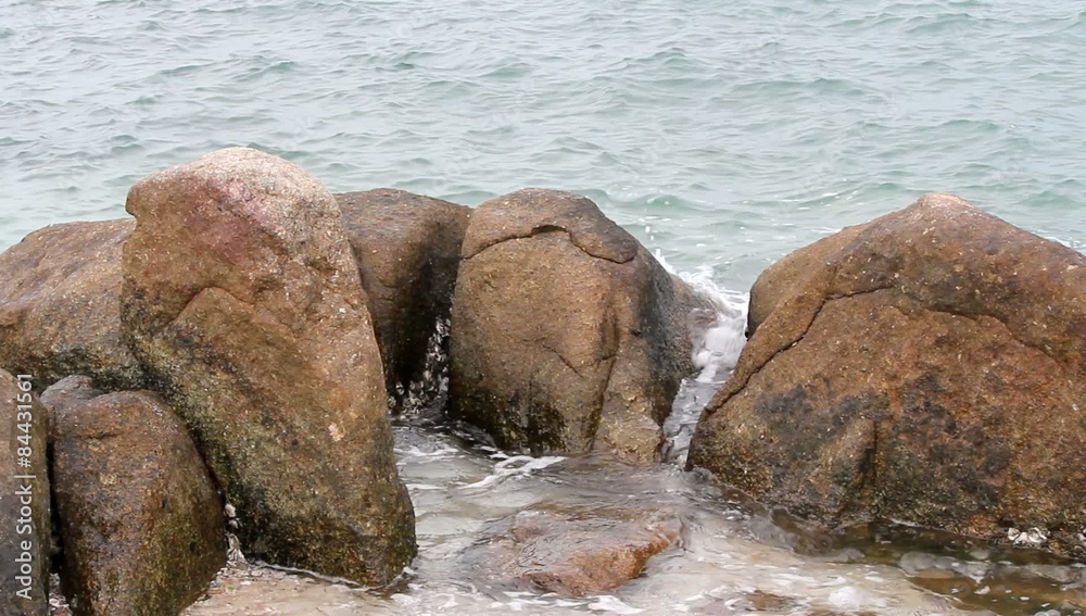 Sea waves hitting rocks on the coast Sea waves hitting rocks on the coast
