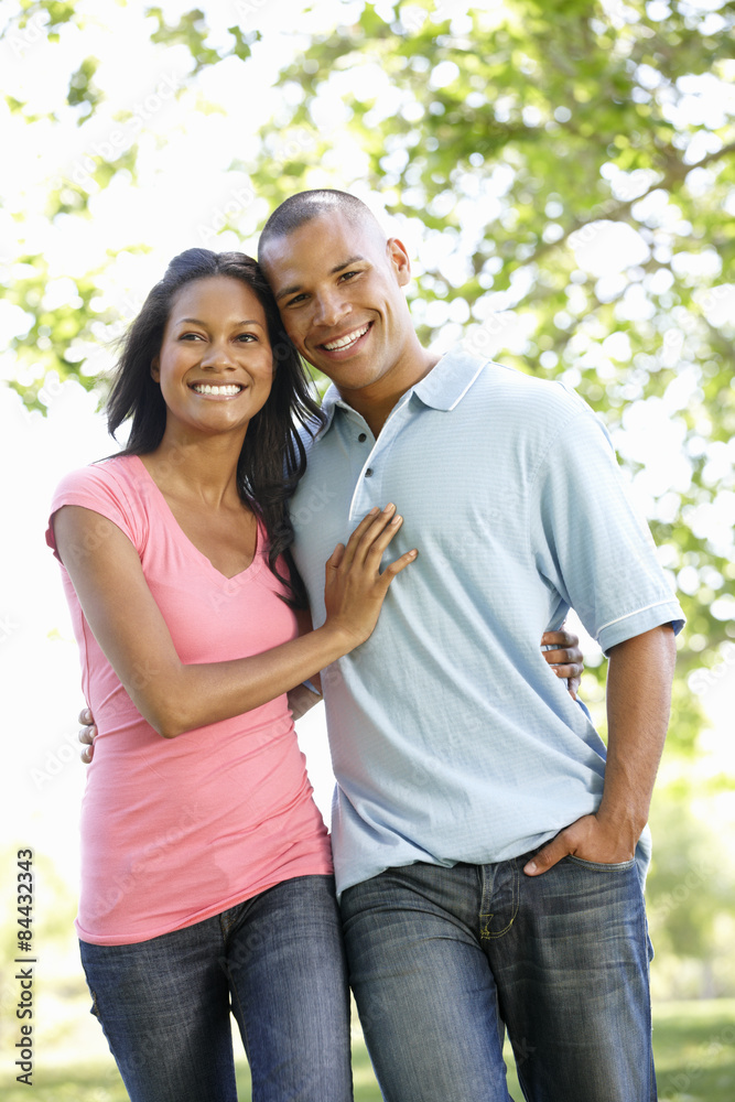 Romantic Young African American Couple Walking In Park Romantic Young African American Couple Walking In Park