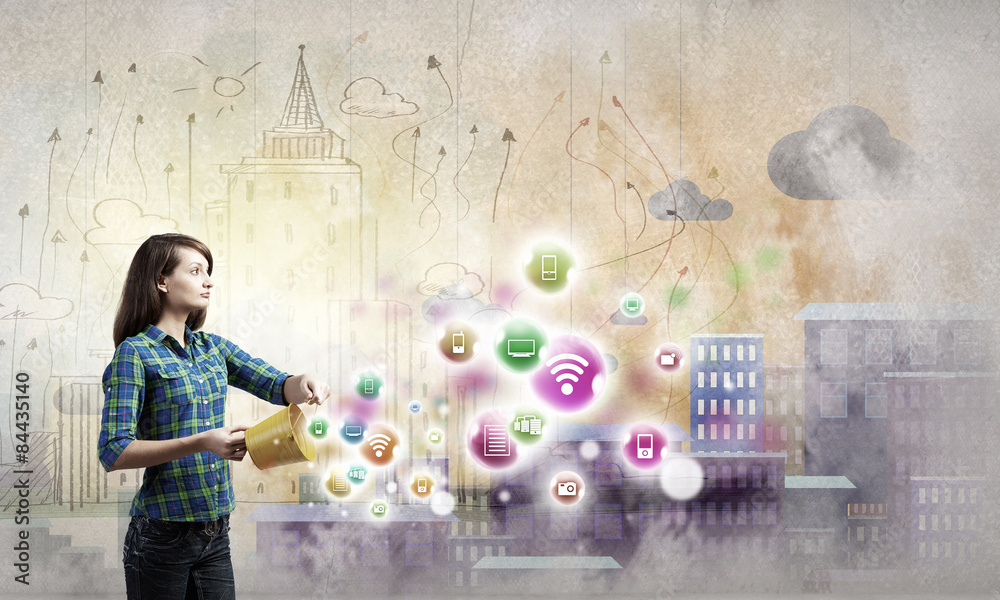 Young woman in casual holding yellow bucket 