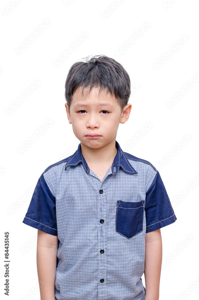 Little Asian boy crying over white background Little Asian boy crying over white background