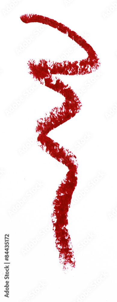 Red color lipstick stroke on background Red color lipstick stroke on background