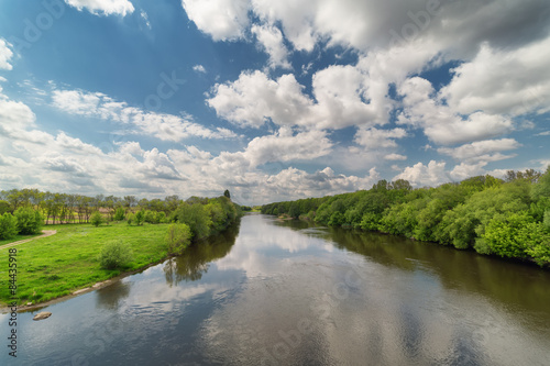 landscape with river and sky with clouds