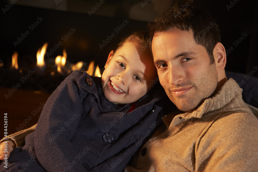 Portrait father and daughter by firelight Portrait father and daughter by firelight