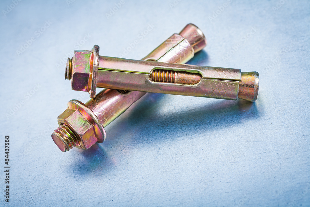 Pair of metal anchor bolts for concrete walls and on metallic ba Pair of metal anchor bolts for concrete walls and on metallic ba