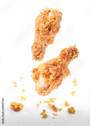 Foto Golden brown fried chicken drumsticks