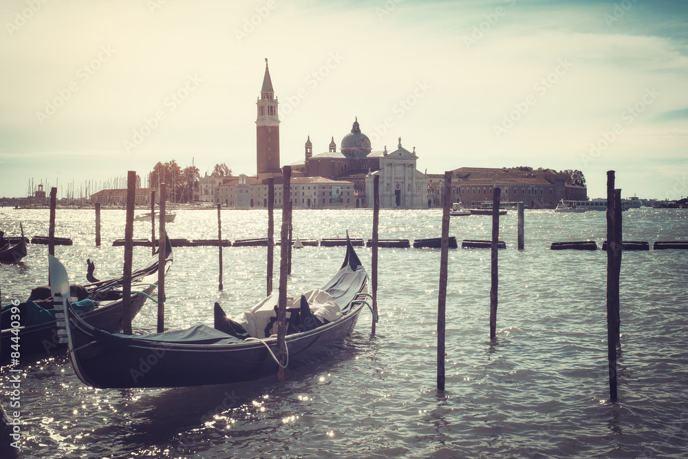 Gondolas docked on Piazza San Marco Venice aged