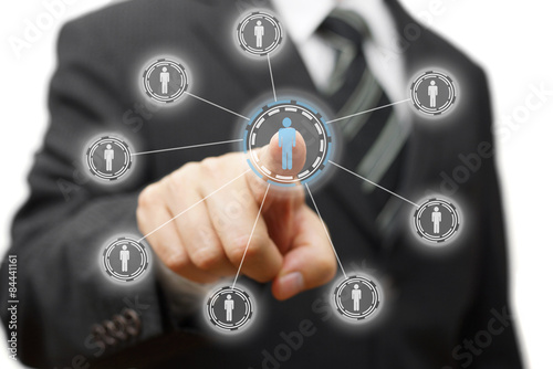 Canvas Print businessman is pressing virtual person, concept of management,st