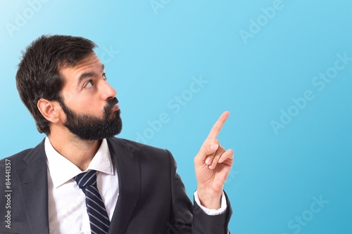 Businessman thinking over isolated white background