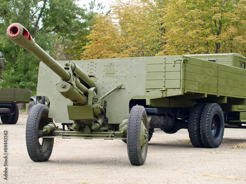 Soviet 76mm cannon gan ZiS3 and army truck ZiS5,(Ural). photo