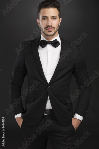 Latin man wearing a tuxedo photo