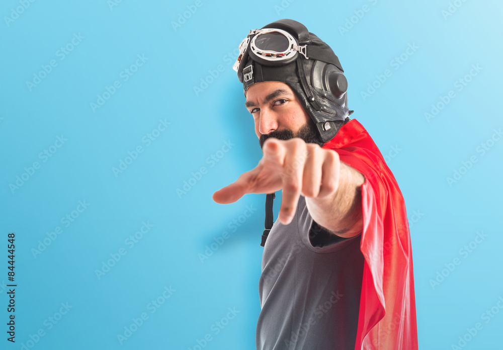 Superhero pointing to the front