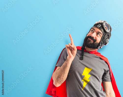 Superhero pointing up