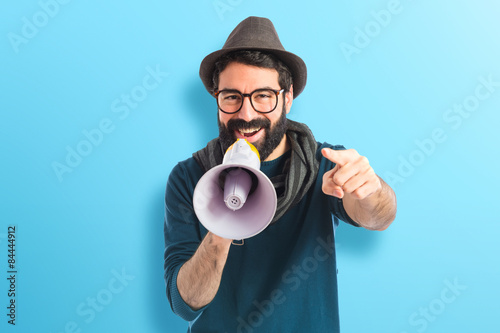 Man shouting by megaphone