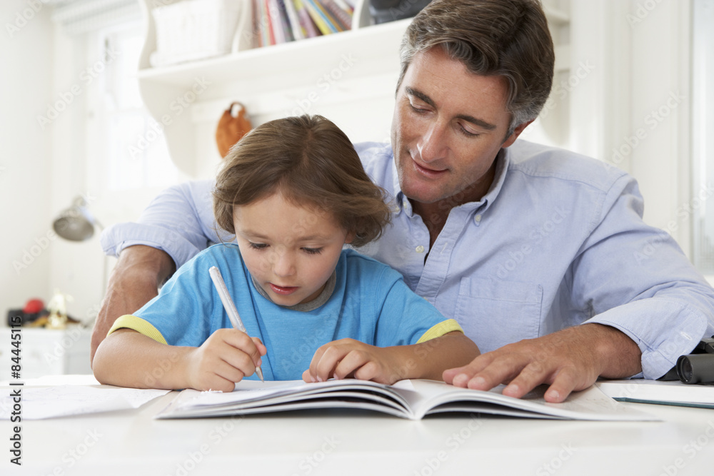 Father Helping Son With Homework Father Helping Son With Homework