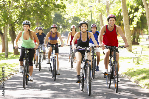Group Of Cyclists On Cycle Ride Through Park © Monkey Business
