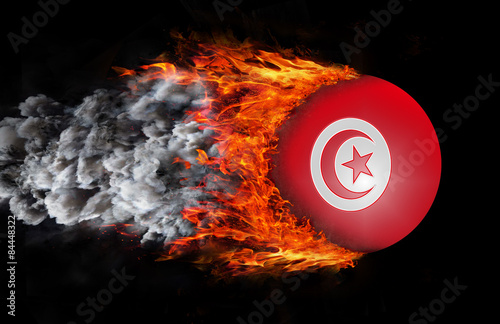 Flag with a trail of fire and smoke - Tunisia photo