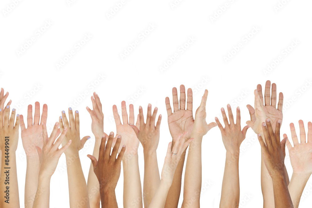 Close Up Of A Group Raising Their Hands