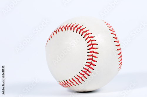 Single baseball with red knit.