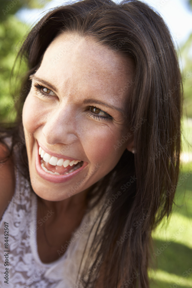 Head And Shoulders Portrait Of Smiling Woman Head And Shoulders Portrait Of Smiling Woman