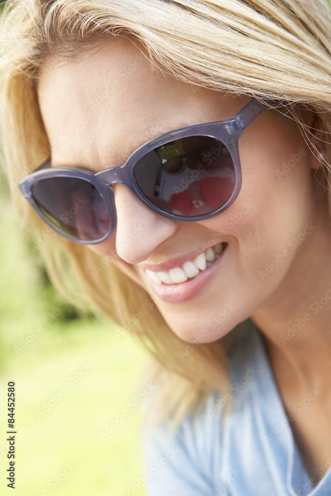 Head And Shoulders Portrait Of Smiling Woman With Sun Hat Head And Shoulders Portrait Of Smiling Woman With Sun Hat