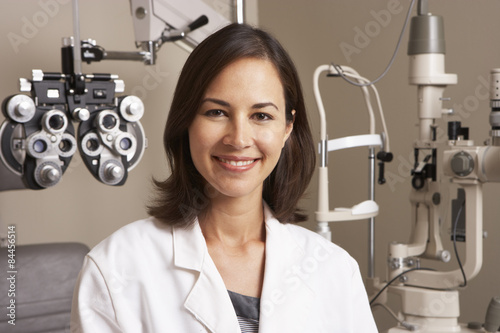 Portrait Of Female Optician In Surgery photo