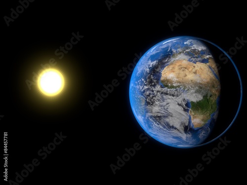 太陽に照らされる神秘的な地球