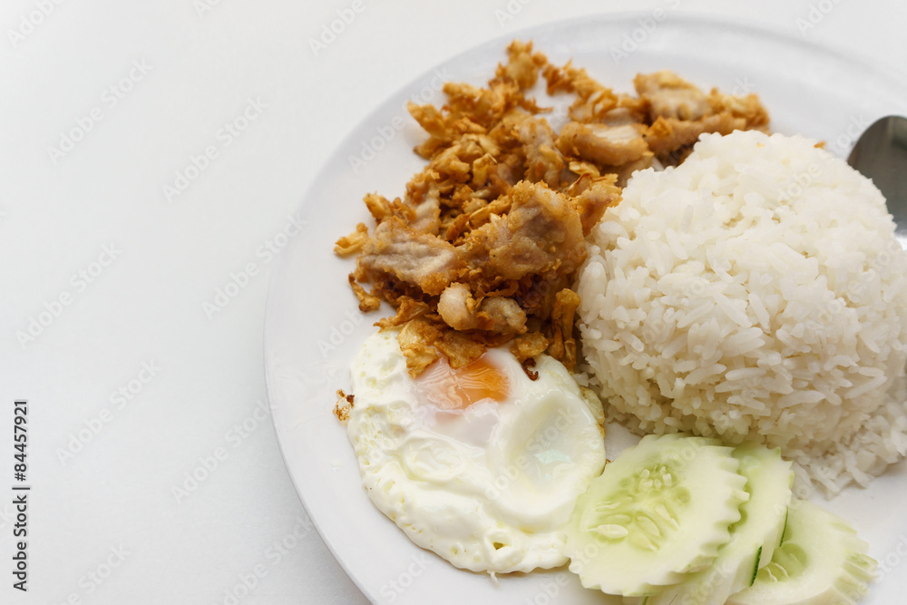 rice with pork fried with garlic and fried egg