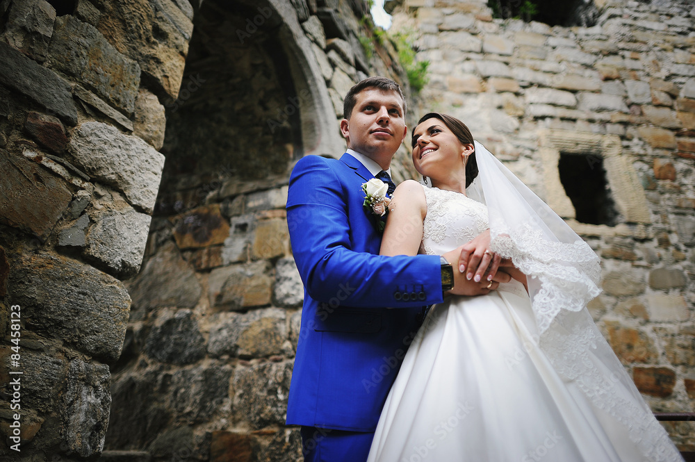 Young wedding couple in love on their wedding day Young wedding couple in love on their wedding day