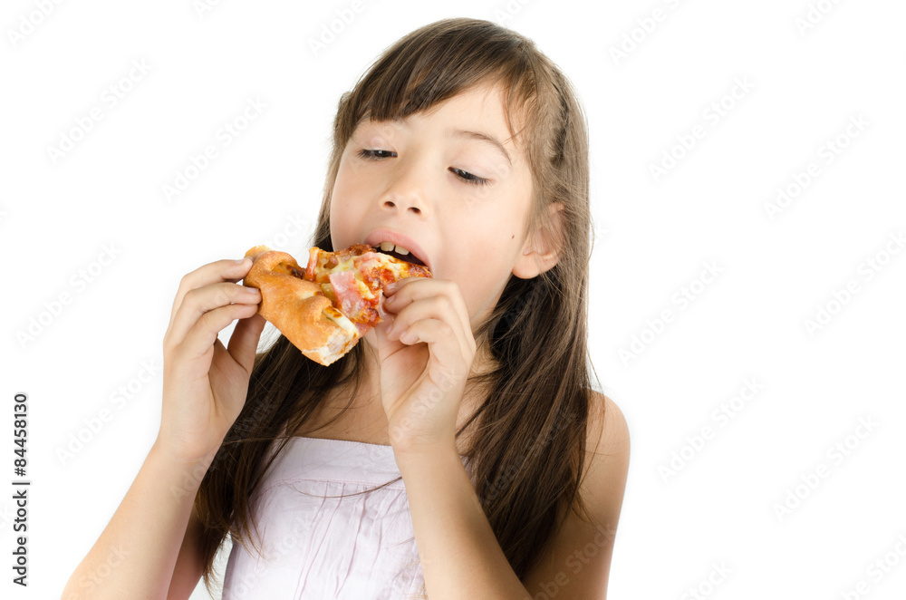 Little girl eating pizza on white background