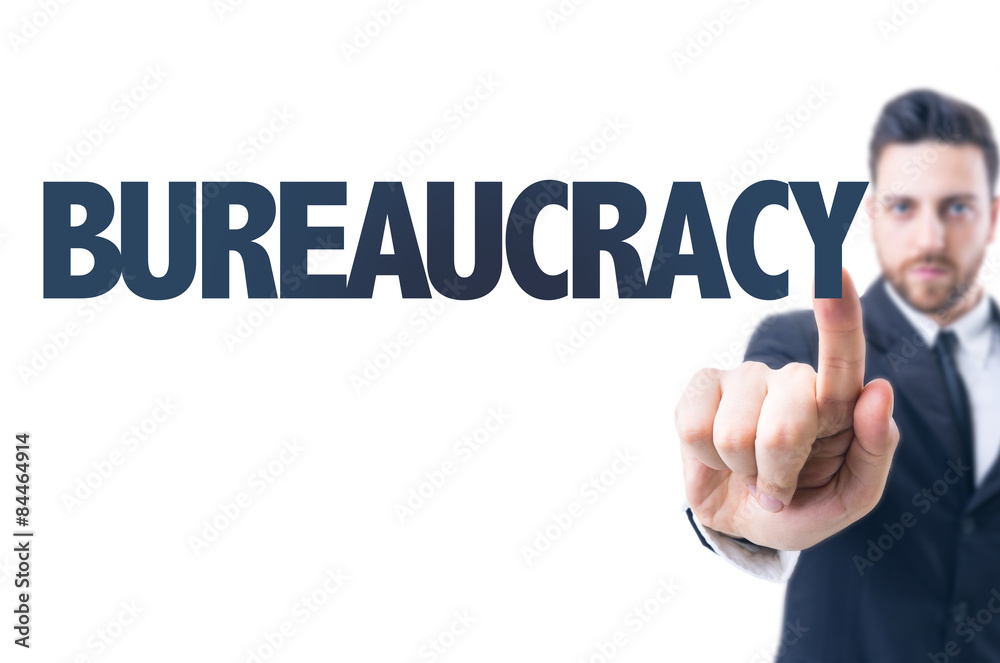 Business man pointing the text: Bureaucracy Business man pointing the text: Bureaucracy