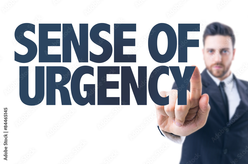Business man pointing the text: Sense of Urgency Business man pointing the text: Sense of Urgency