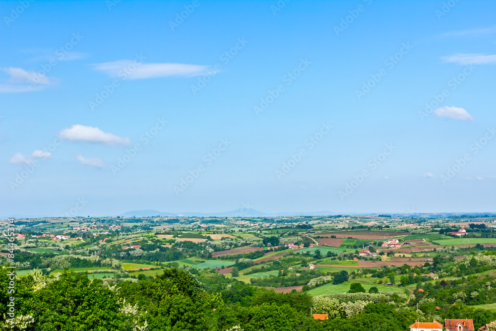 Fototapeta premium Agricultural fields in hilly landscape