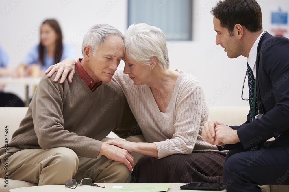 Senior Couple Discussing Test Results With Doctor
