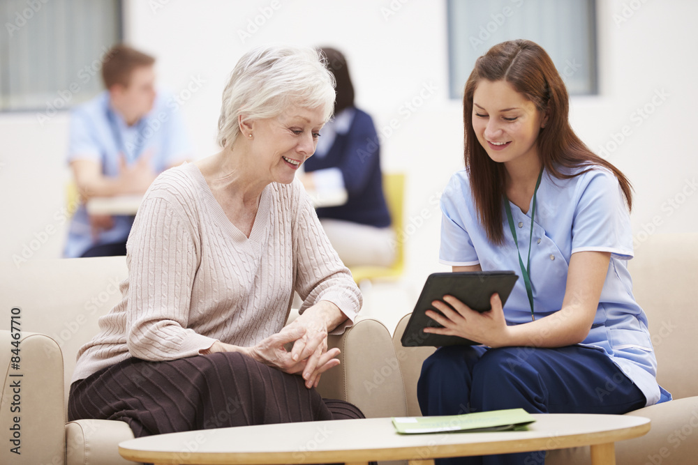 Senior Woman Discussing Test Results With Nurse Senior Woman Discussing Test Results With Nurse