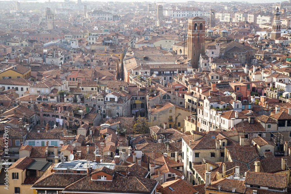 Aerial view of UNESCO World Heritage Site Venice cityscape with roofs of houses