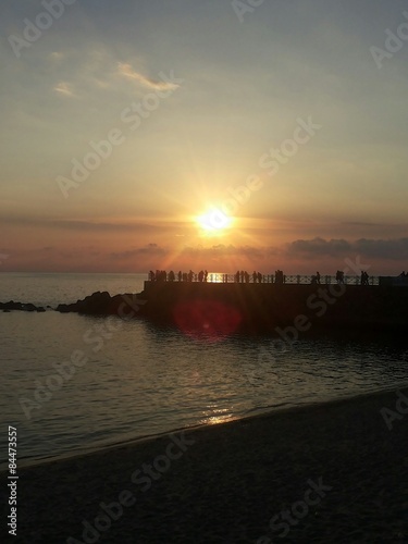 Persone al tramonto
