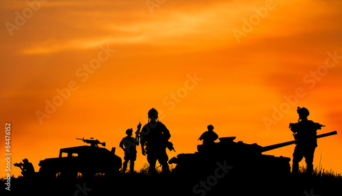 Silhouette of military sold...