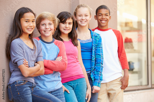 Group Of Children Hanging Out Together In Mall