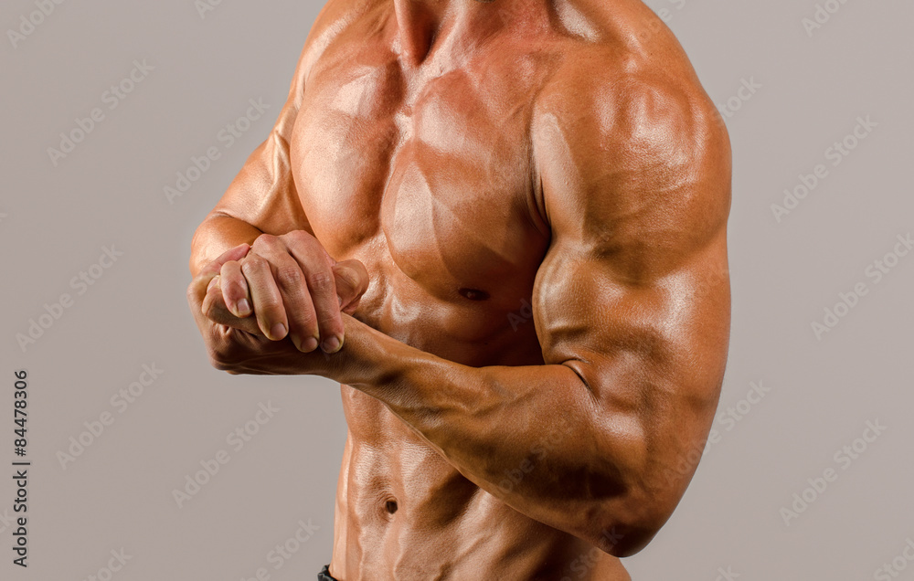 Bodybuilder topless, flexing his biceps. Strong man with perfect abs,  shoulders,biceps, triceps and chest. Isolated on white background Stock  Photo by ©iulianvalentin 68289813