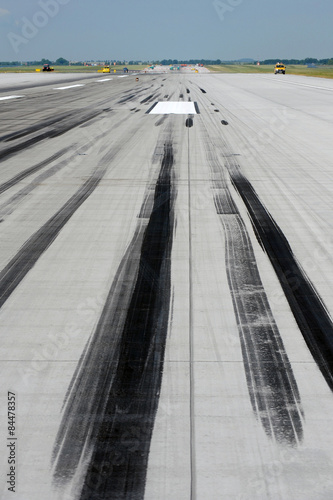 Skid marks on runway photo