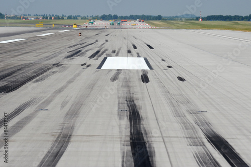 Skid marks on runway photo