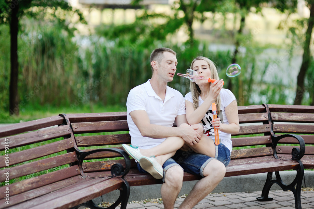 couple blow bubbles couple blow bubbles