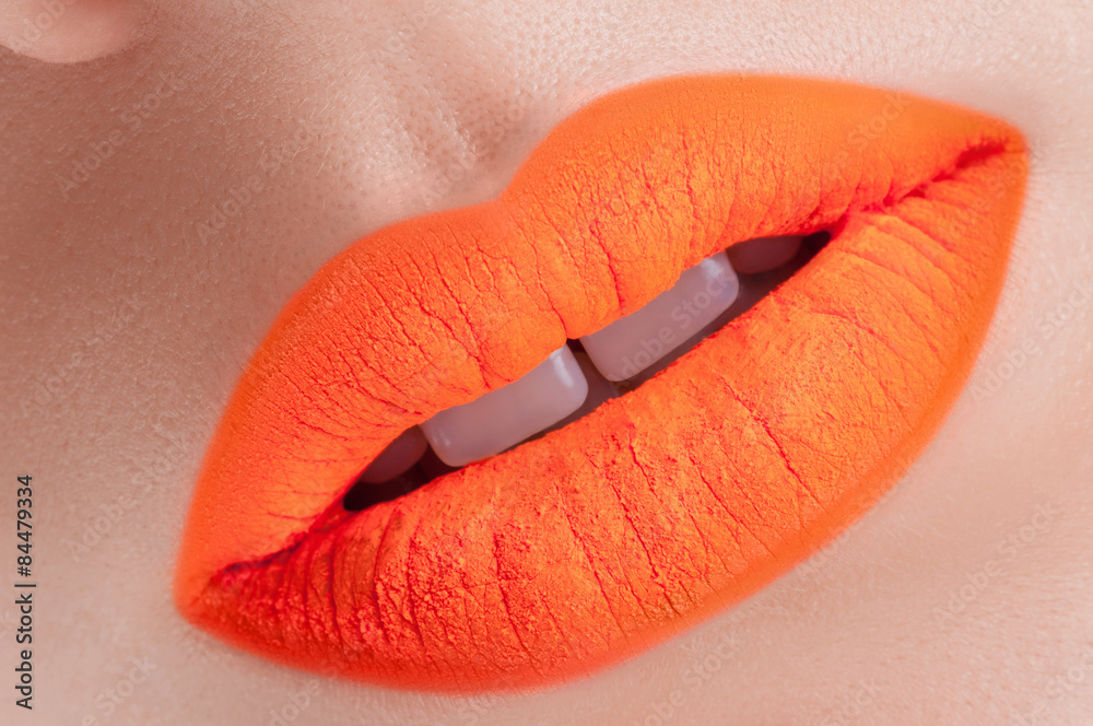 Fototapeta premium Beautiful acid orange lips