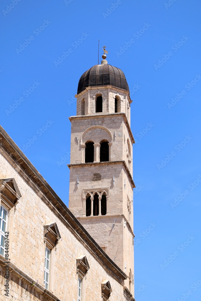 Franciscan monastery bell tower in Stradun, main street in Dubrovnik. 