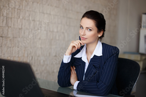 Portrait of confident businesswoman in office photo