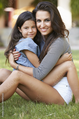 Portrait Of Loving Mother And Daughter In Garden © Monkey Business