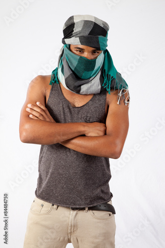 Black man wearing an Arabic head scarf