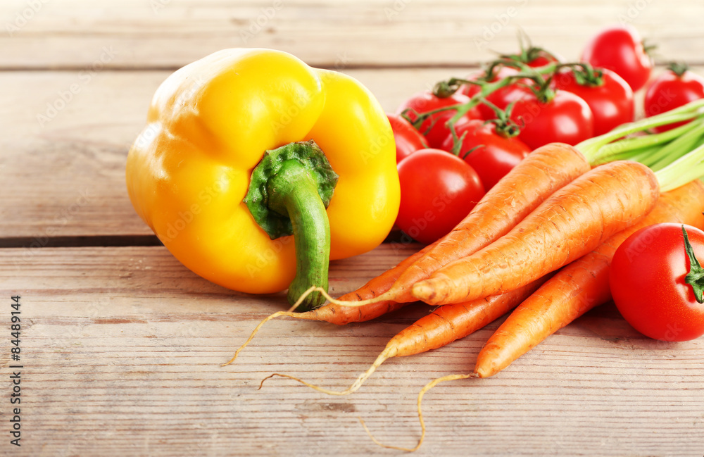 Fresh vegetables on wooden table, closeup Fresh vegetables on wooden table, closeup