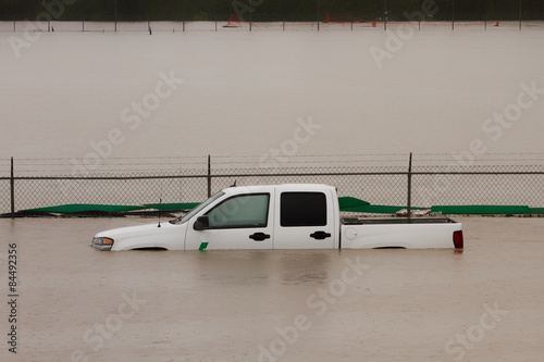 White truck submerged in flood water during the 2013 Calgary flood.